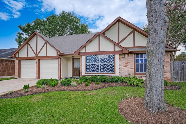 2415 Pebbledowne Cir, Sugar Land, TX 77478 - english style home with a garage, concrete driveway, and brick siding