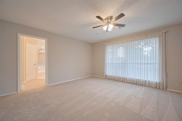 2415 Pebbledowne Cir, Sugar Land, TX 77478 - carpeted spare room with ceiling fan and a textured ceiling