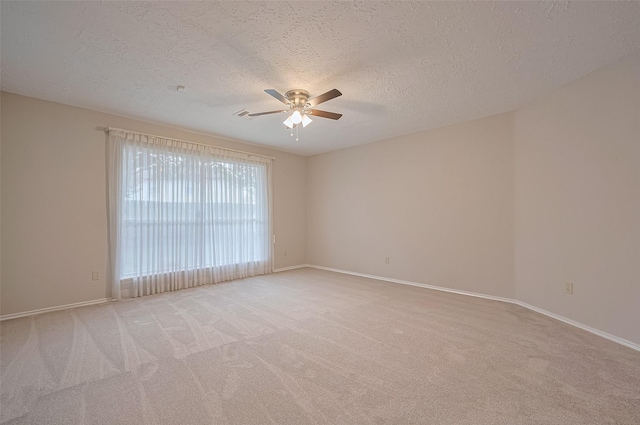 2415 Pebbledowne Cir, Sugar Land, TX 77478 - unfurnished room featuring ceiling fan, a textured ceiling, and carpet