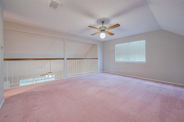 2415 Pebbledowne Cir, Sugar Land, TX 77478 - carpeted empty room featuring a ceiling fan, a textured ceiling, and lofted ceiling