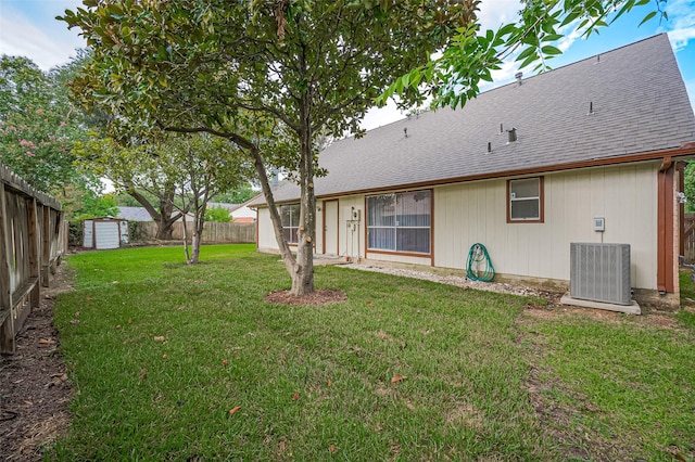 2415 Pebbledowne Cir, Sugar Land, TX 77478 - fenced backyard with a storage unit