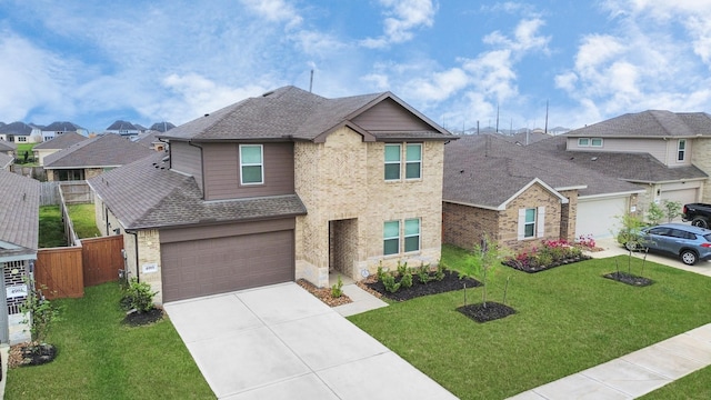 4985 Blue Beetle Ridge Dr, Katy, TX 77493 - view of front of house featuring a residential view, concrete driveway, brick siding, roof with shingles, and an attached garage
