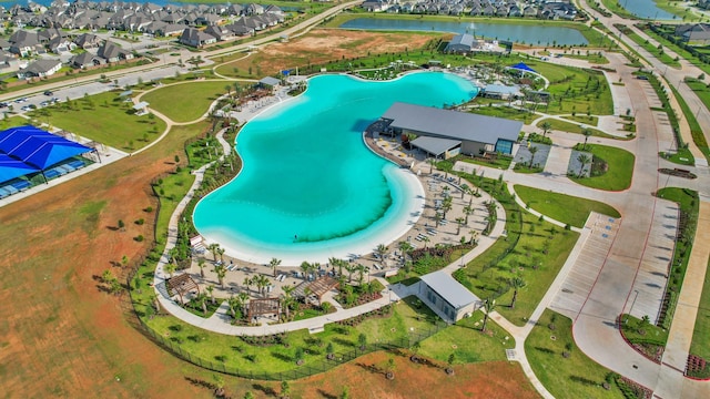 4985 Blue Beetle Ridge Dr, Katy, TX 77493 - bird's eye view of a pool and a nearby body of water