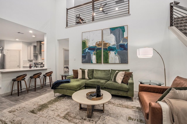 12810 Barnesbury Ln, Houston, TX 77047 - living area with wood finished floors and recessed lighting