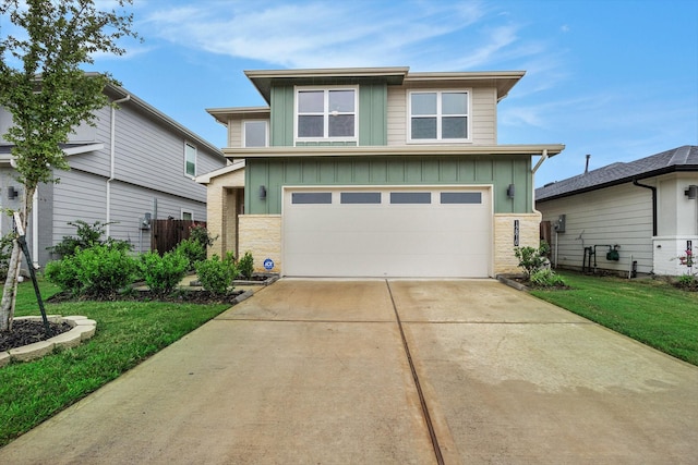 12810 Barnesbury Ln, Houston, TX 77047 - view of front of home with board and batten siding, brick siding, driveway, and an attached garage