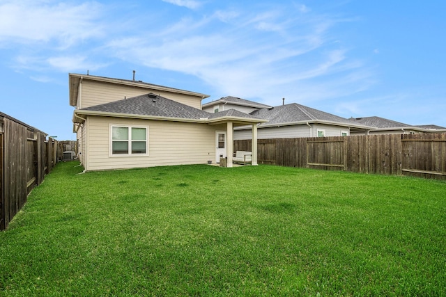 12810 Barnesbury Ln, Houston, TX 77047 - rear view of house with a fenced backyard