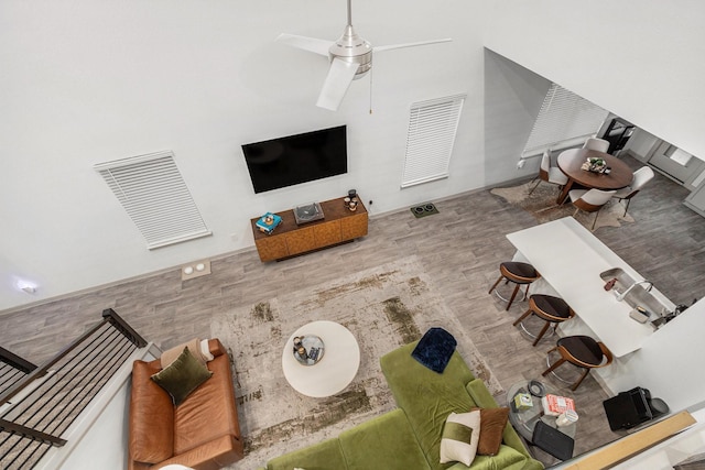 12810 Barnesbury Ln, Houston, TX 77047 - living room featuring wood finished floors and a ceiling fan