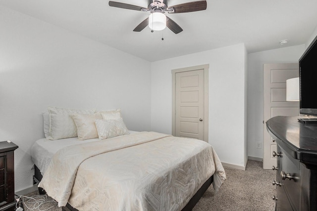 12810 Barnesbury Ln, Houston, TX 77047 - bedroom featuring light colored carpet and ceiling fan