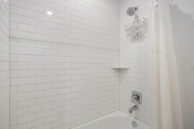 12810 Barnesbury Ln, Houston, TX 77047 - bathroom featuring shower / tub combo