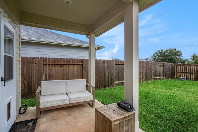 12810 Barnesbury Ln, Houston, TX 77047 - fenced backyard with a patio area and outdoor lounge area