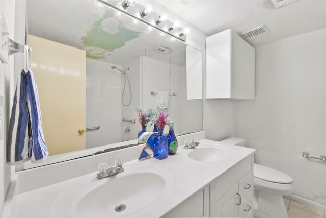 1202 Fay Rd, Kemah, TX 77565 - bathroom with double vanity and tile patterned floors