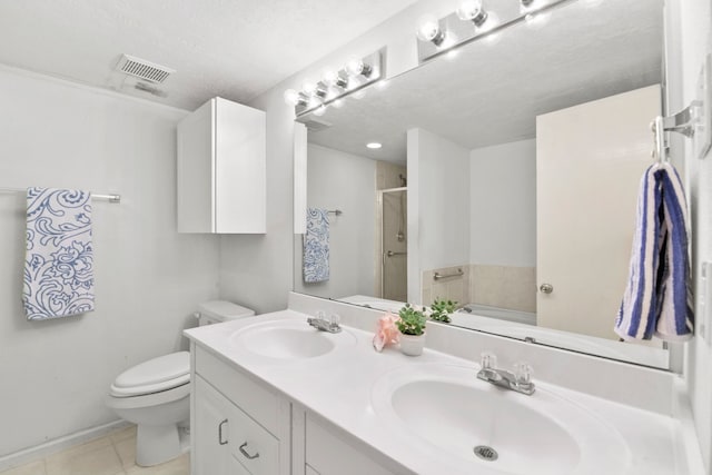 1202 Fay Rd, Kemah, TX 77565 - bathroom featuring a bath, double vanity, a stall shower, and tile patterned floors