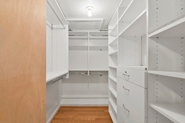 1202 Fay Rd, Kemah, TX 77565 - walk in closet with wood finished floors
