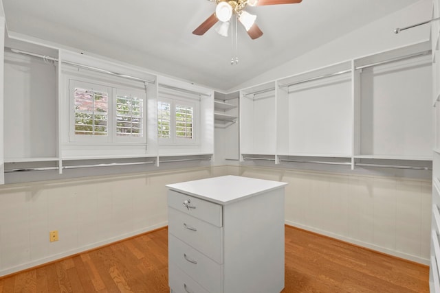 1202 Fay Rd, Kemah, TX 77565 - walk in closet with a ceiling fan, light wood-style floors, and vaulted ceiling