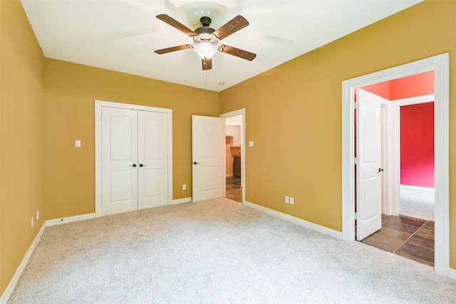 26150 Crown Ranch Blvd, Montgomery, TX 77316 - unfurnished bedroom featuring carpet, a closet, and ceiling fan