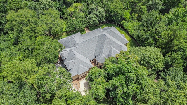 26150 Crown Ranch Blvd, Montgomery, TX 77316 - aerial view of property and surrounding area with a heavily wooded area
