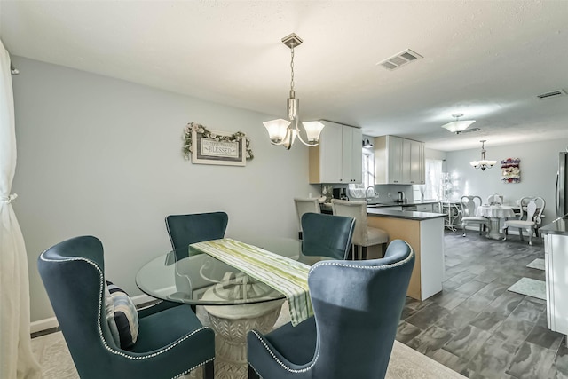 637 Mosswood Dr, Conroe, TX 77302 - dining area with a chandelier