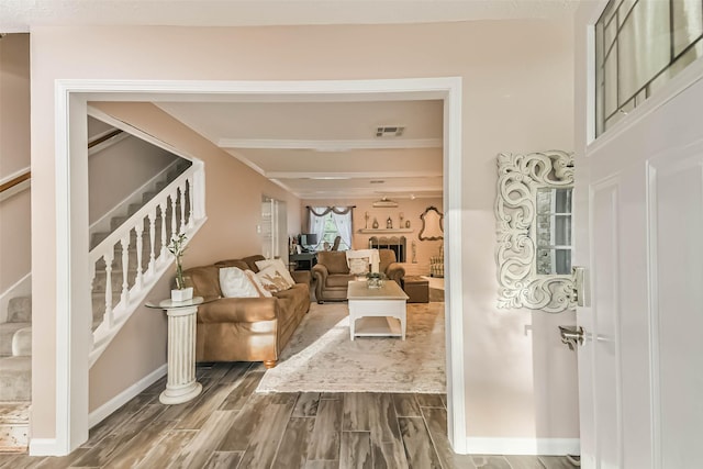 637 Mosswood Dr, Conroe, TX 77302 - living room featuring stairs and dark wood finished floors