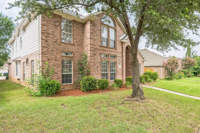 412 Belmont Ct, Lewisville, TX 75067 - traditional home with brick siding and a front yard