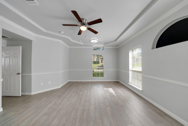 412 Belmont Ct, Lewisville, TX 75067 - unfurnished room with wood finished floors, a ceiling fan, and a raised ceiling
