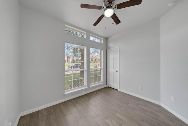 412 Belmont Ct, Lewisville, TX 75067 - unfurnished room featuring wood finished floors and ceiling fan
