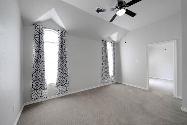 412 Belmont Ct, Lewisville, TX 75067 - carpeted spare room with vaulted ceiling and ceiling fan