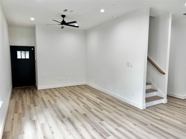 2328 Wavell St, Houston, TX 77088 - unfurnished living room featuring light wood-style flooring, ceiling fan, recessed lighting, and stairway