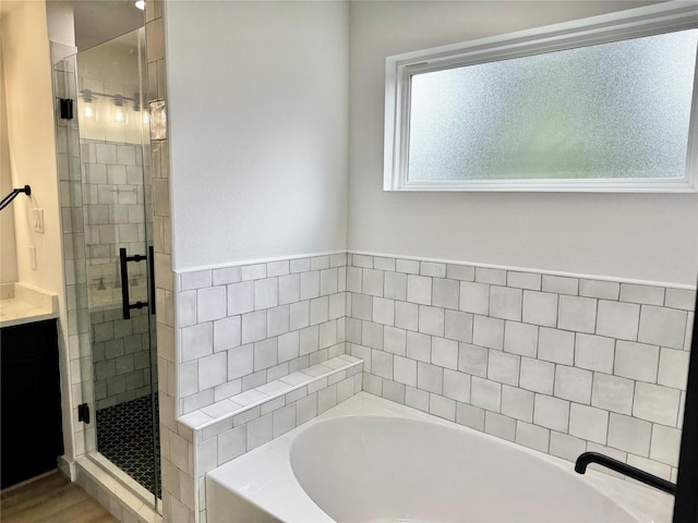 2328 Wavell St, Houston, TX 77088 - full bathroom featuring a garden tub, a shower stall, and vanity