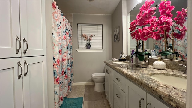 2514 Creekleaf Rd, Houston, TX 77068 - bathroom with double vanity, tile patterned floors, and a shower with curtain