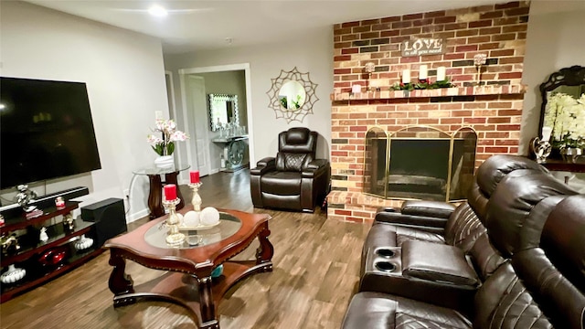 2514 Creekleaf Rd, Houston, TX 77068 - living area with wood finished floors and a fireplace