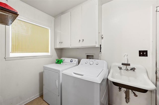 446 Norwood St, Marlin, TX 76661 - washroom featuring independent washer and dryer and cabinet space