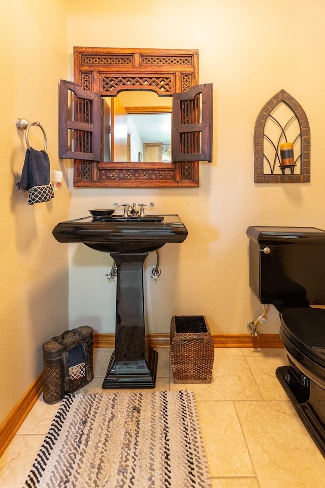 1211 Tall Pines Dr, Friendswood, TX 77546 - bathroom with toilet and baseboards