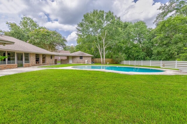 1211 Tall Pines Dr, Friendswood, TX 77546 - view of pool with a fenced backyard