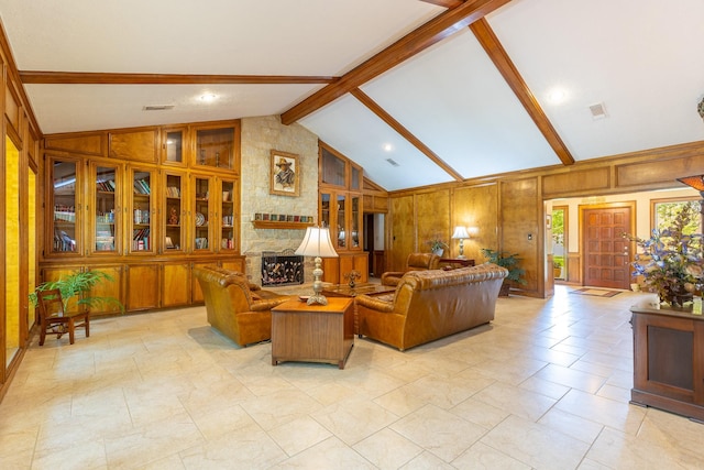 1211 Tall Pines Dr, Friendswood, TX 77546 - living room featuring wood walls and a stone fireplace