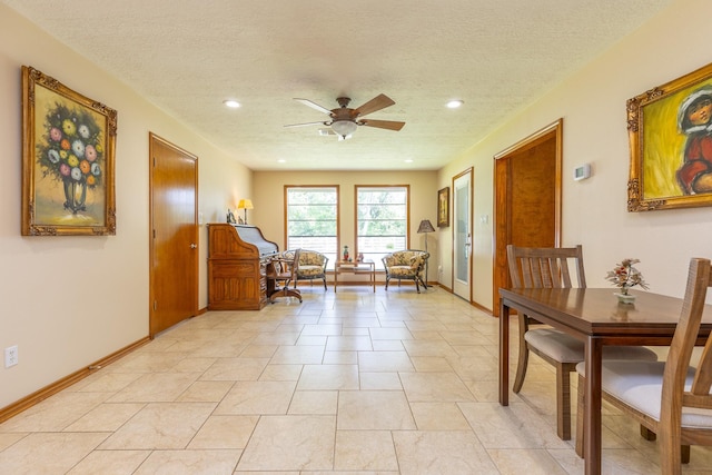 1211 Tall Pines Dr, Friendswood, TX 77546 - sitting room featuring a ceiling fan, a textured ceiling, and recessed lighting