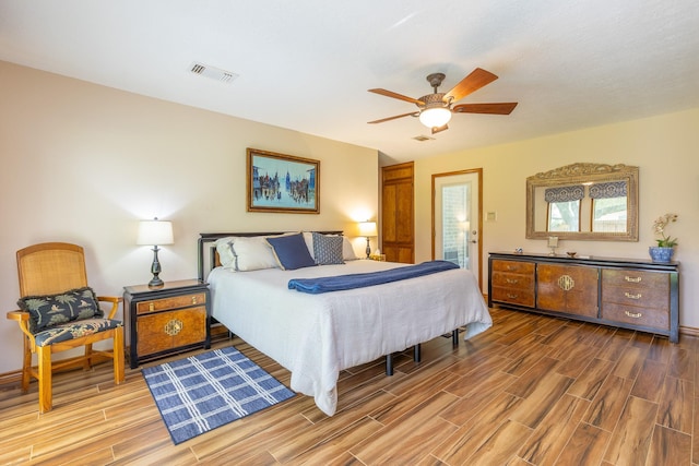 1211 Tall Pines Dr, Friendswood, TX 77546 - bedroom featuring light wood-style flooring and ceiling fan