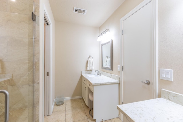 1211 Tall Pines Dr, Friendswood, TX 77546 - full bath featuring vanity, tile patterned floors, and tiled shower