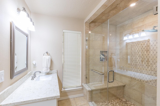 1211 Tall Pines Dr, Friendswood, TX 77546 - bathroom with vanity, a shower stall, and tile patterned floors