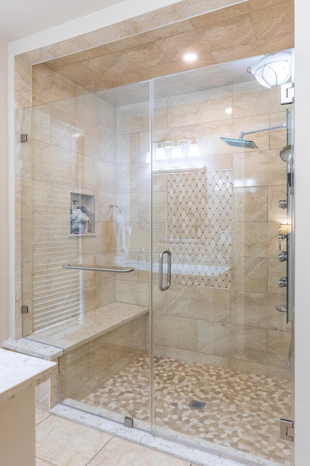 1211 Tall Pines Dr, Friendswood, TX 77546 - full bathroom with a shower stall and tile patterned floors