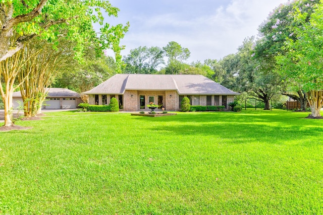 1211 Tall Pines Dr, Friendswood, TX 77546 - ranch-style home with a detached garage