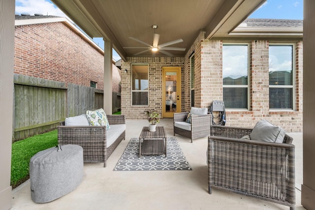 29522 Westhope Dr, Spring, TX 77386 - fenced backyard with ceiling fan, a patio, and an outdoor hangout area