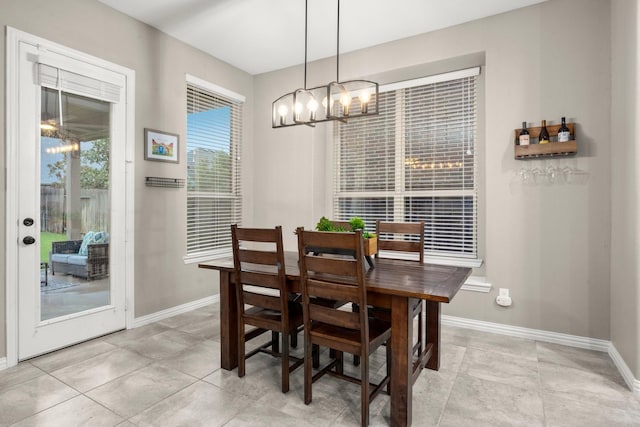 29522 Westhope Dr, Spring, TX 77386 - dining room with a chandelier and baseboards