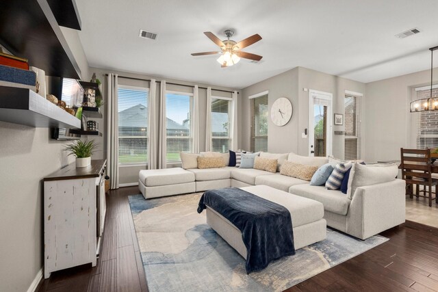 29522 Westhope Dr, Spring, TX 77386 - living room with a ceiling fan, a chandelier, and dark wood-style floors