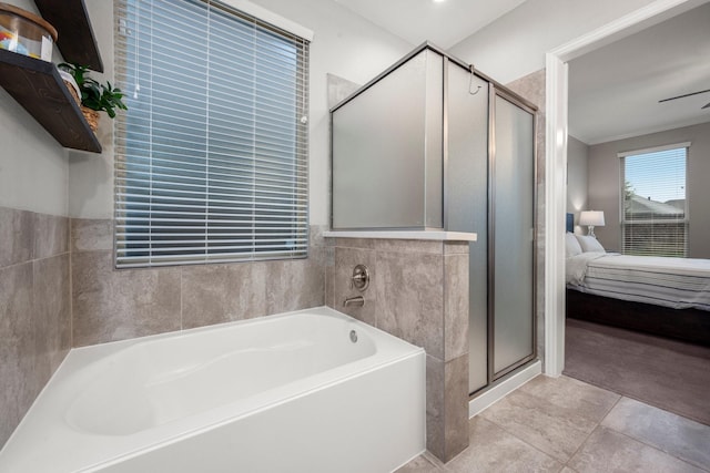 29522 Westhope Dr, Spring, TX 77386 - ensuite bathroom with a garden tub, a shower stall, tile patterned flooring, and ornamental molding