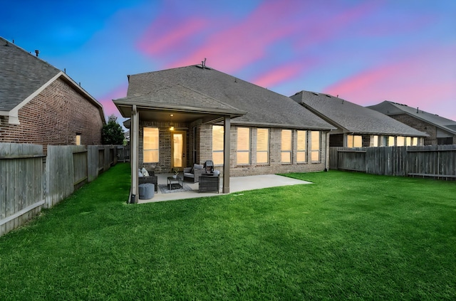 29522 Westhope Dr, Spring, TX 77386 - rear view of house featuring a patio area, a fenced backyard, brick siding, and roof with shingles