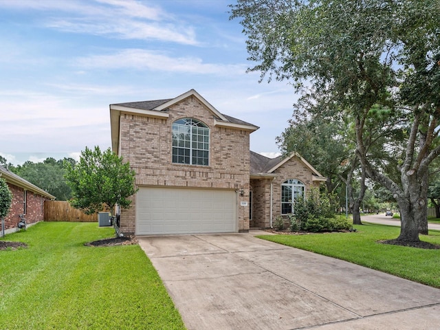 3139 Prairiestone Trail Ln, Katy, TX 77450 - traditional home featuring brick siding, an attached garage, concrete driveway, and roof with shingles