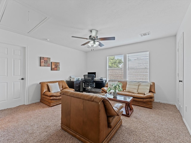 3139 Prairiestone Trail Ln, Katy, TX 77450 - carpeted living area with attic access, ceiling fan, and a desk