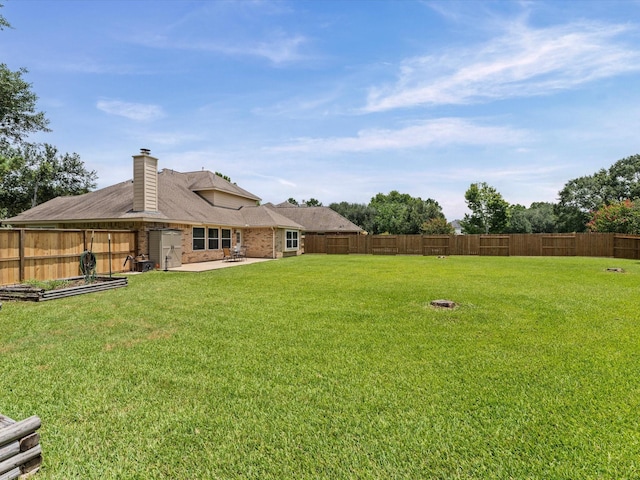 3139 Prairiestone Trail Ln, Katy, TX 77450 - fenced backyard with a patio area