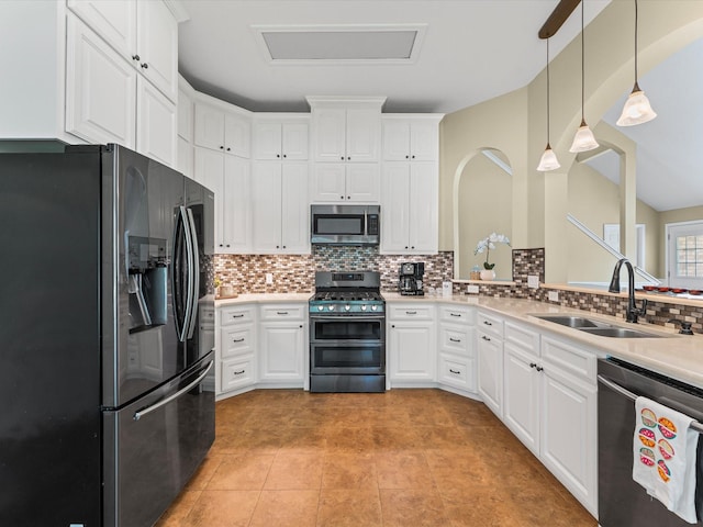 3139 Prairiestone Trail Ln, Katy, TX 77450 - kitchen with stainless steel appliances, tasteful backsplash, white cabinetry, light tile patterned flooring, and light countertops