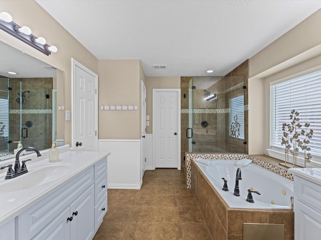 3139 Prairiestone Trail Ln, Katy, TX 77450 - full bathroom featuring vanity, a shower stall, and a tub with jets